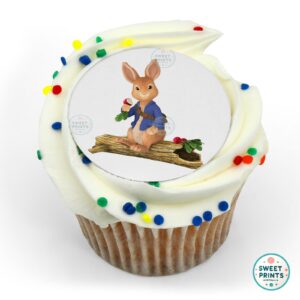 peter rabbit sitting on tree trunk o